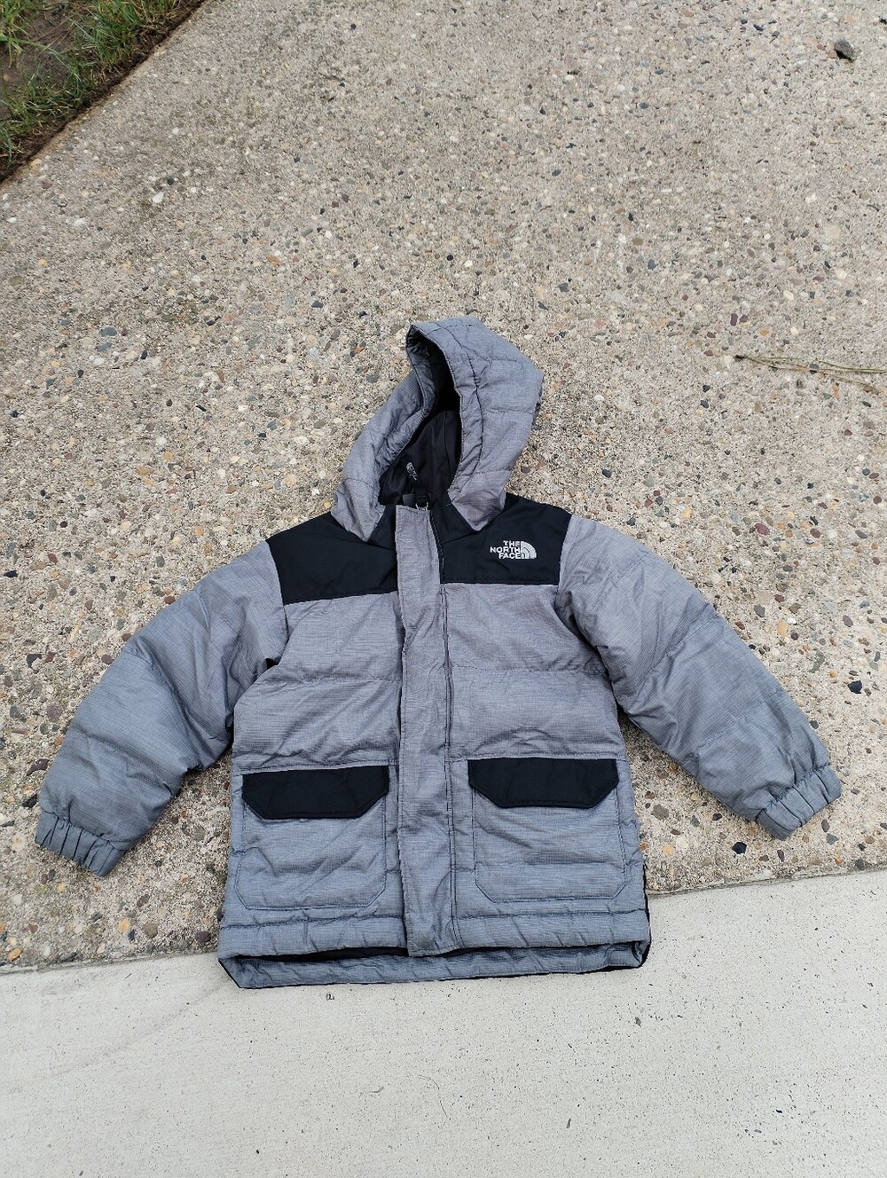 The North Face Kids Gray and Black Puffer Jacket size 3t/3b stains on sleeves